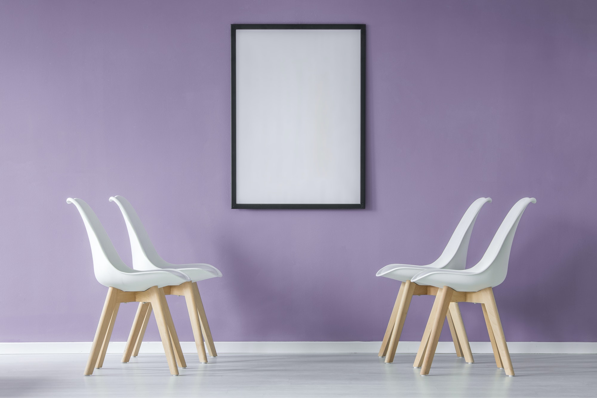 Interior with chairs and poster